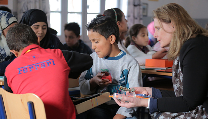 GBC-Education Executive Chair Sarah Brown works with students using Kano kits in Lebanon.