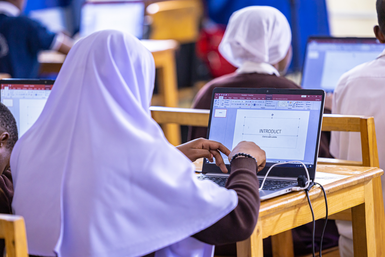 A girl uses a laptop during a lesson in the Skills for Their Future programme.