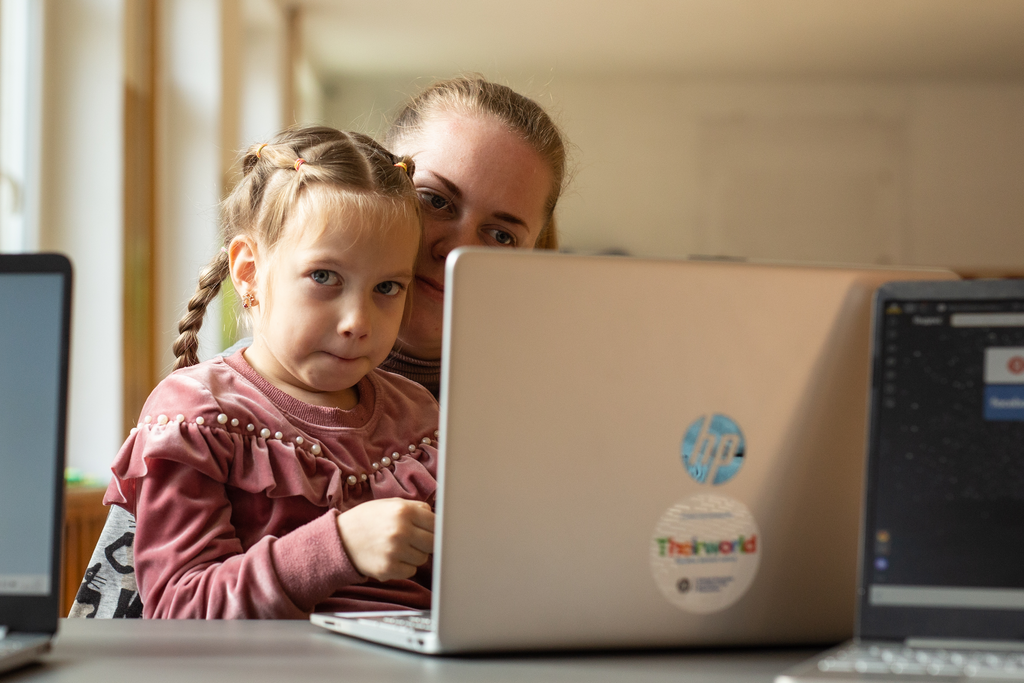 Veronika 5, with Mariia and a laptop from the Digital Equity for Ukraine project.